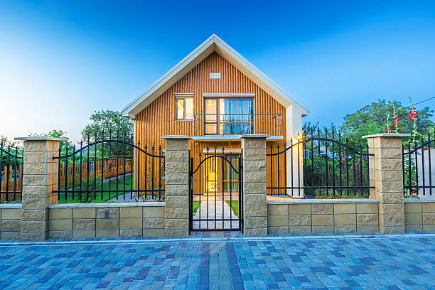istock Beautiful wooden house with a lawn. 623065806