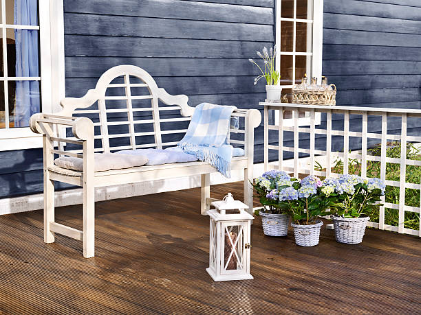 istock Garden with sofa for a wooden house 623066294