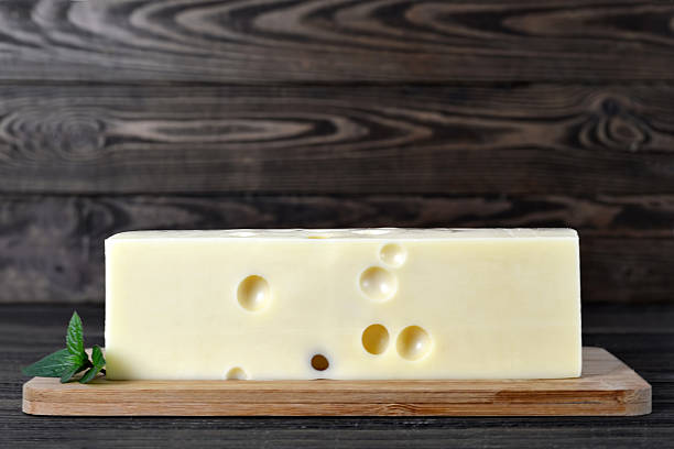 istock Emmental cheese on wooden board 623066748
