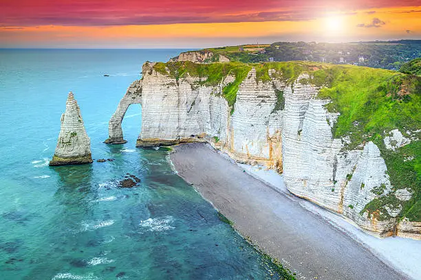 Stunning cliffs Aval of Etretat with beautiful famous coastline and wonderful sunset,Normandy,France,Europe