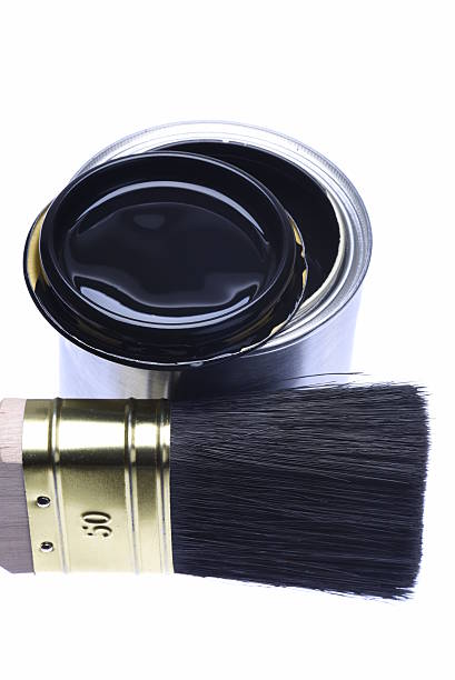 istock Black paint can with paintbrush 623067468