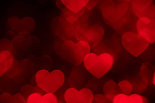 istock light red heart bokeh background photo, abstract holiday backdrop 623067902
