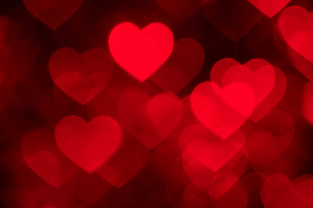 istock light red heart bokeh background photo, abstract holiday backdrop 623069026