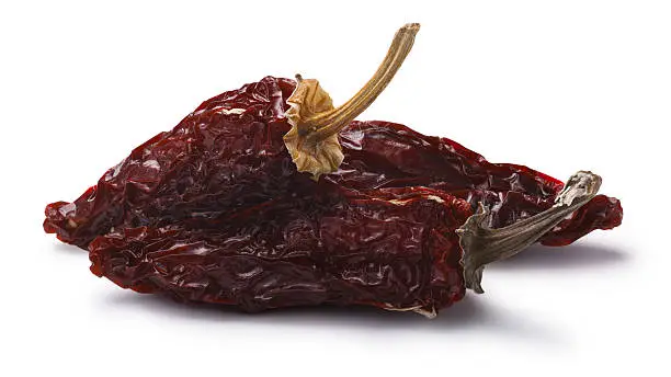Chipotle morita, a whole smoke-dried overripe Jalapeno peppers. Clipping paths, shadow separated