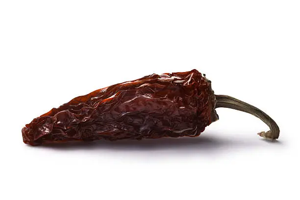 Chipotle morita, a whole smoked overripe Jalapeno pepper. Clipping paths, shadow separated