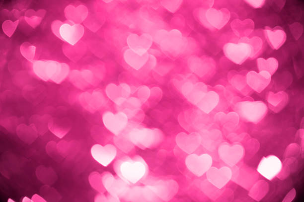 istock pink heart bokeh background photo, abstract holiday backdrop 623069482