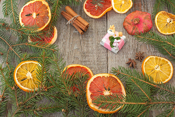 istock Christmas composition. Spruce branches, dried oranges, grapefruit, cinnamon, Christmas toys, 623088990