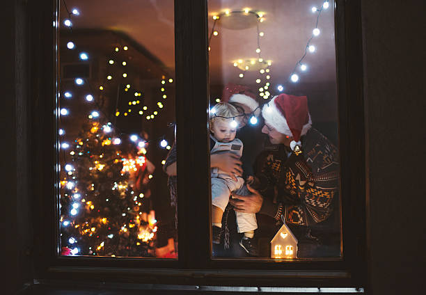 istock Young family enjoy in Christmas night 623094720