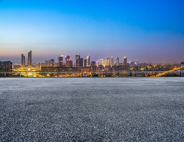 istock Empty floor and modern city skyline in Nanjing at night 623094804