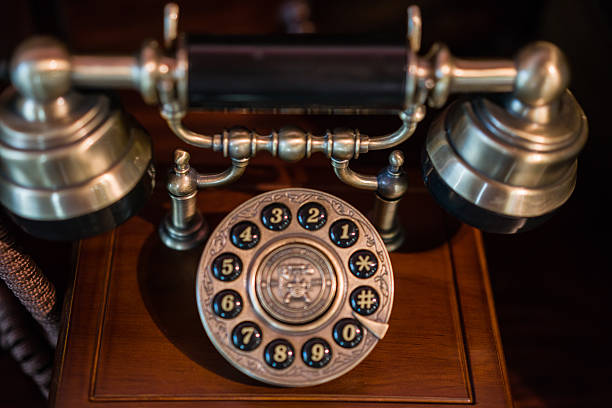 Antique Victorian-Style Rotary Telephone Sitting on Table