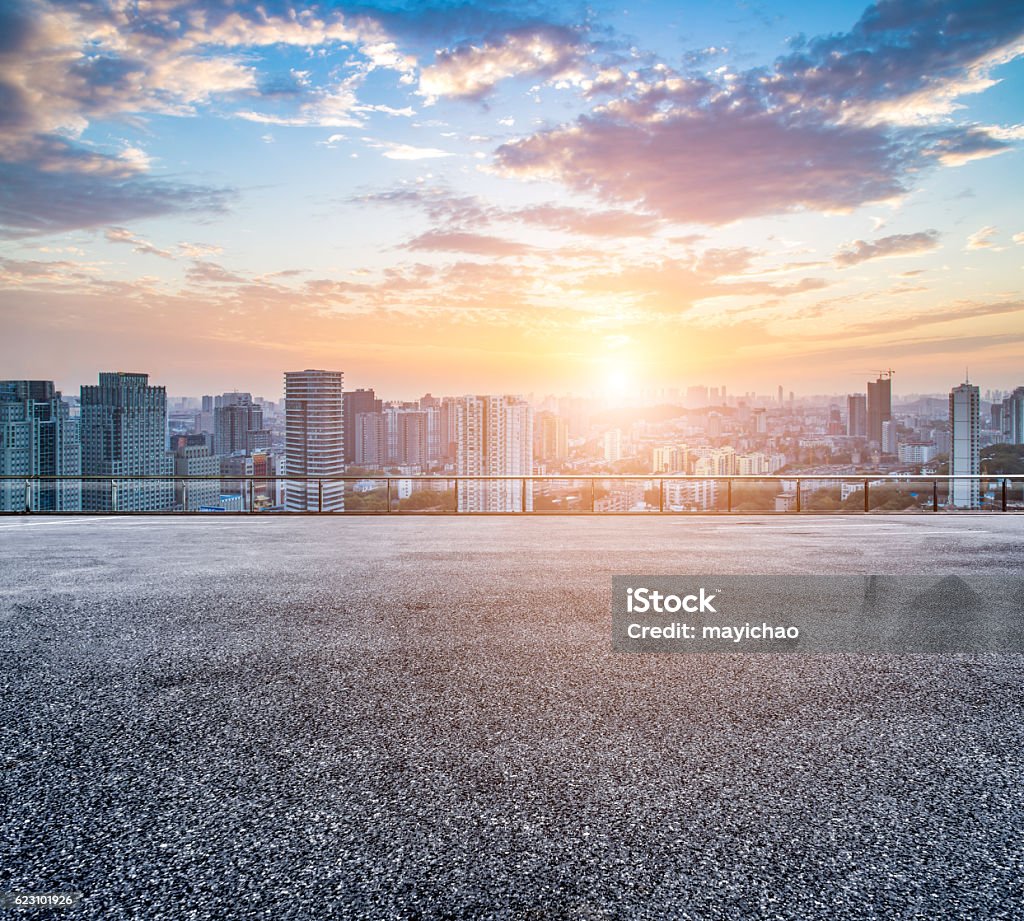 Empty floor and modern city skyline in wuhan,china Empty floor and modern city skyline in wuhan,chinaEmpty floor and modern city skyline in wuhan,china City Street Stock Photo