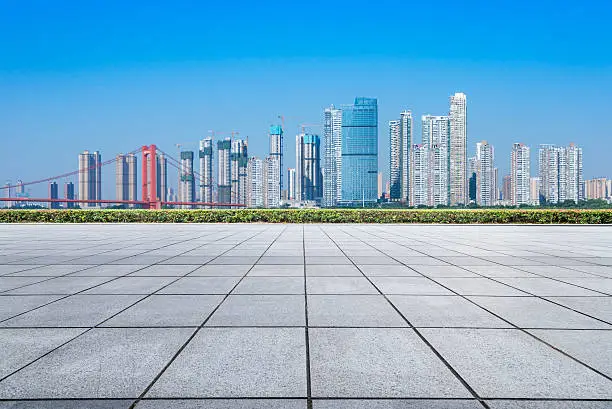 Empty floor and modern city skyline in wuhan,chinaEmpty floor and modern city skyline in wuhan,china