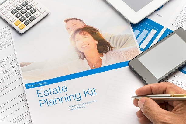 istock Estate planning brochure with mature couple 623105406