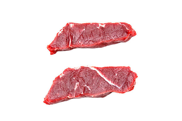 istock Two pieces of raw beef steak, strip loin. Insulated. 623110686