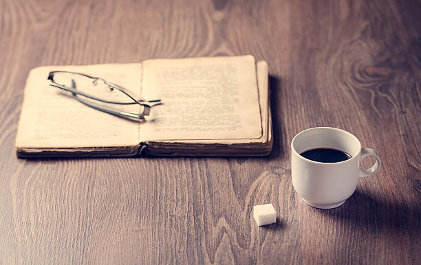 istock Cup of coffee on sackcloth a wooden 623111556
