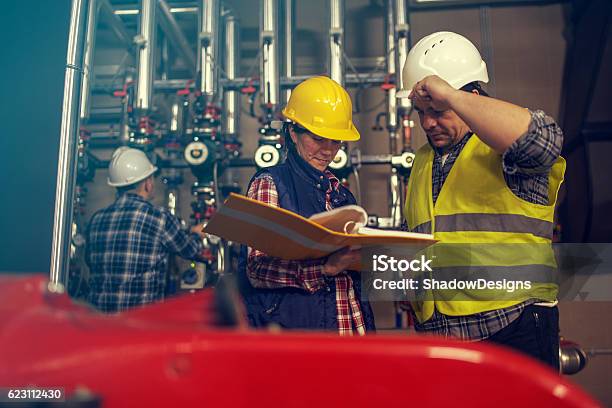 Technicians Working In Factory Or Utility Stock Photo - Download Image Now - Air Duct, Engineer, Safety