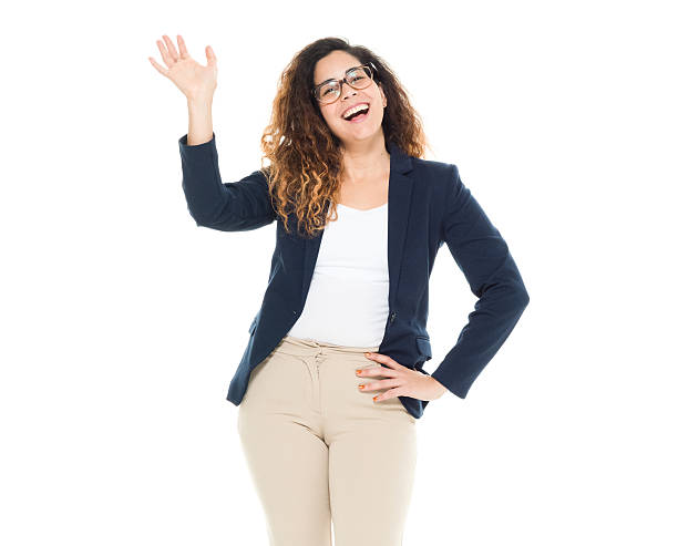 Cheerful businesswoman waving hand