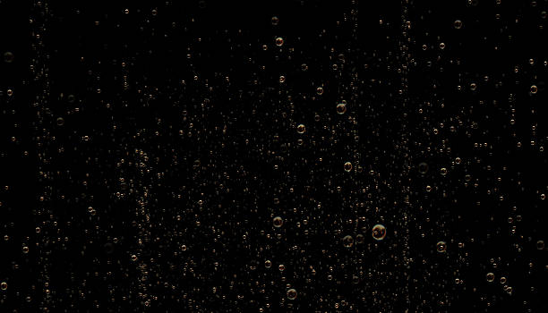 istock Golden Colored Sparkling Champagne Bubbles 623115206