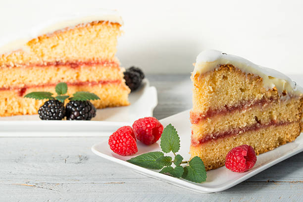 istock Slice of cake with fresh berries and mint leaves 623115350