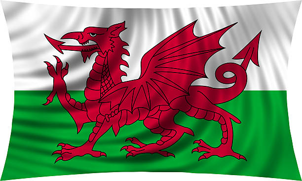 istock Flag of Wales waving isolated on white 623115872