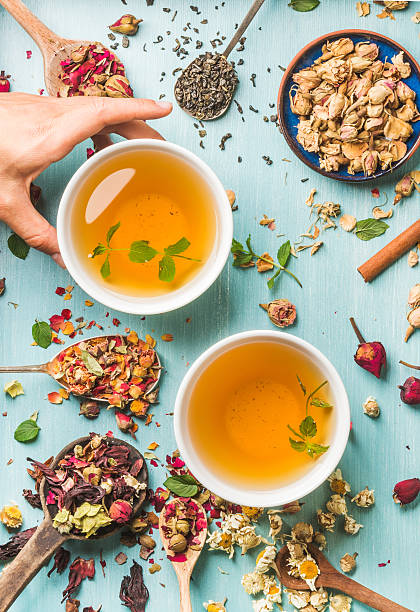 istock Two cups of healthy herbal tea with mint, cinnamon, dried 623116108