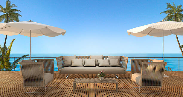 istock 3d rendering vintage beach sofa on wood terrace near sea 623117274