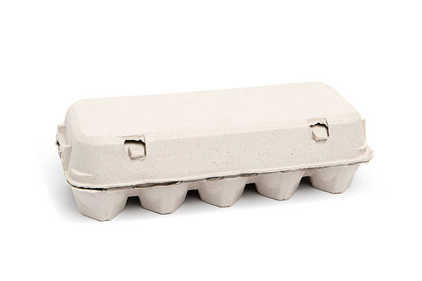 Egg carton for ten eggs, closed, isolated Egg carton for ten eggs, closed, isolated egg carton stock pictures, royalty-free photos & images