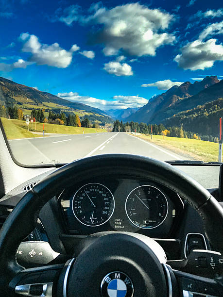 Brunico, Italy - October 30, 2016: Interior view of the dashboard of a Bmw 2 series car  on the road to the South Tyrol, in Trentino Alto Adige, italy. Sunny day.