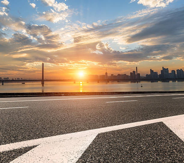 istock Asphalt road and the beautiful urban skyline 623119500
