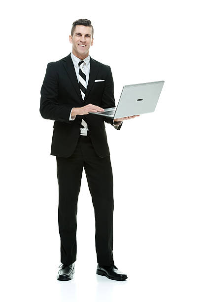 istock Smiling businessman working on laptop 623120226
