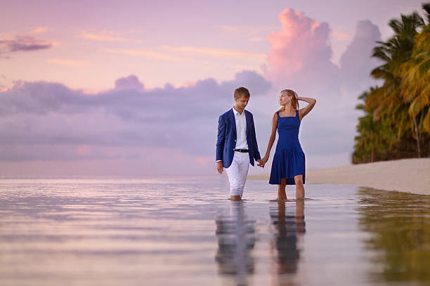 istock Beautiful romantic couple on a tropical beach 623121290