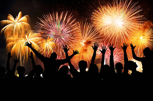 istock Group of people enjoying spectacular fireworks 623123460