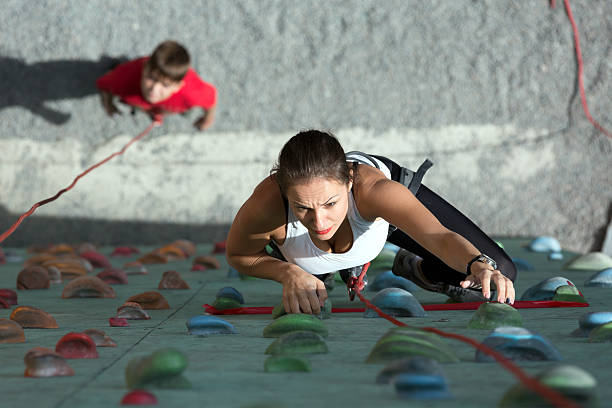 Street climbing wall close-up view with color grips