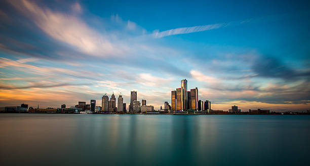 Detroit Panorama A panorama of the Detroit, Michigan skyline, as seen from across the Detroit River in Windsor, Ontario. detroit michigan stock pictures, royalty-free photos & images