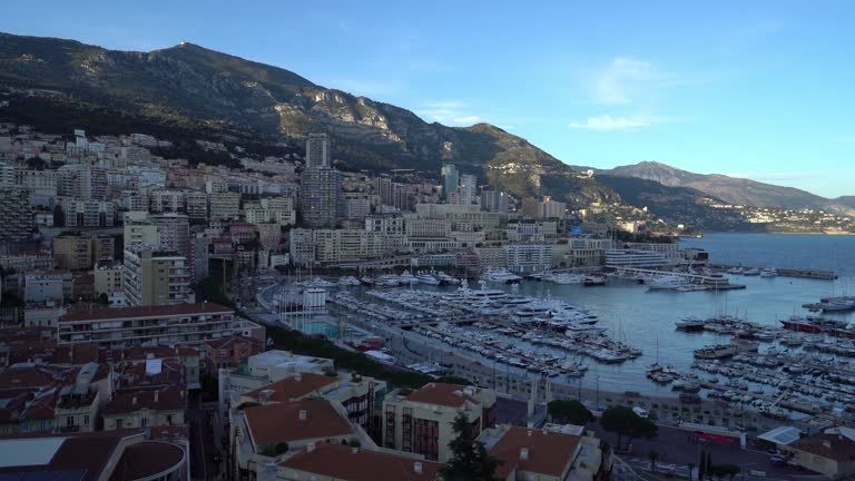 panning shot Aerial Monaco Monte Carlo harbour french riviera sunset