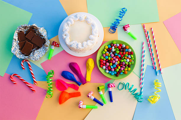 istock Cake, candy, chocolate, whistles, streamers, balloons 623174326
