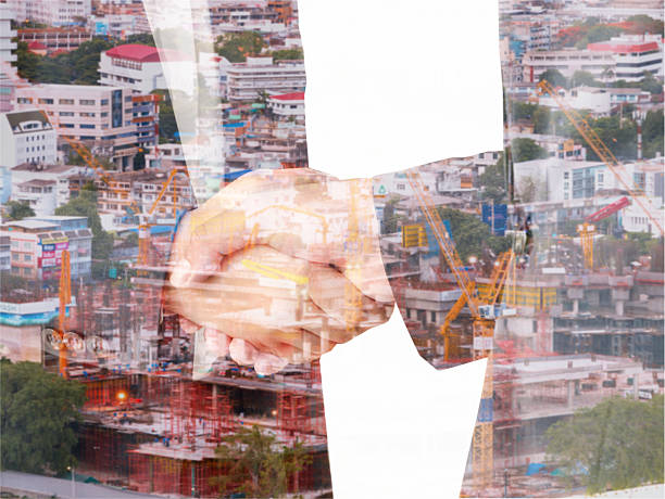 istock Double exposure business man shaking hand for business 623174788