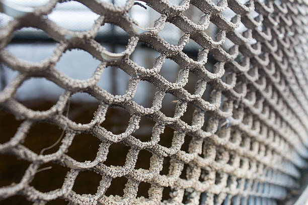 istock Metal old bronze texture as the mesh and cells 623177138