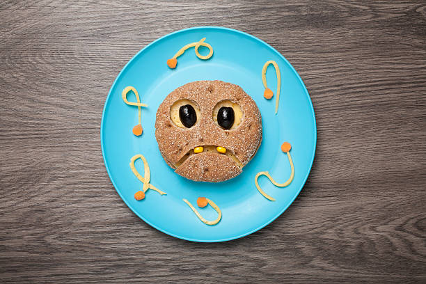 istock Ghost made of bread on plate and board 623178018