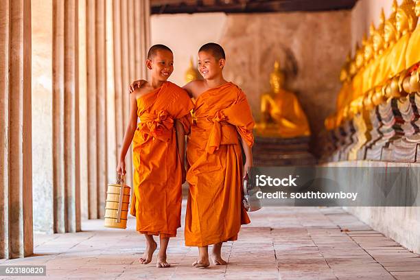 Two Novices Walking And Talking In Old Temple Stock Photo - Download Image Now - Monk - Religious Occupation, Thailand, Nepal