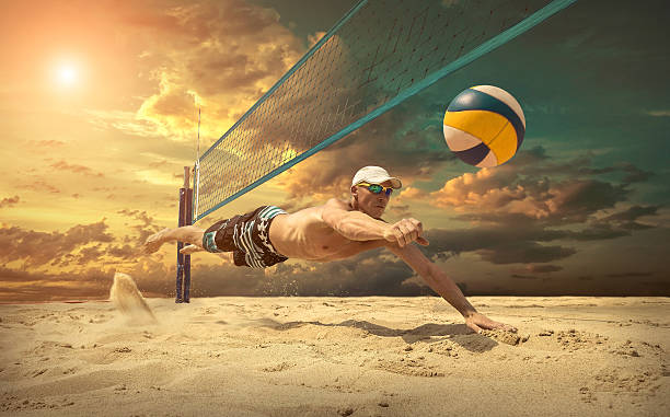 istock Beach volleyball player in action at sunny day under sky. 623182362
