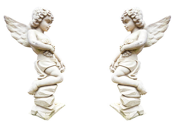 istock Statue of two angels with flowers isolated on white 623190270