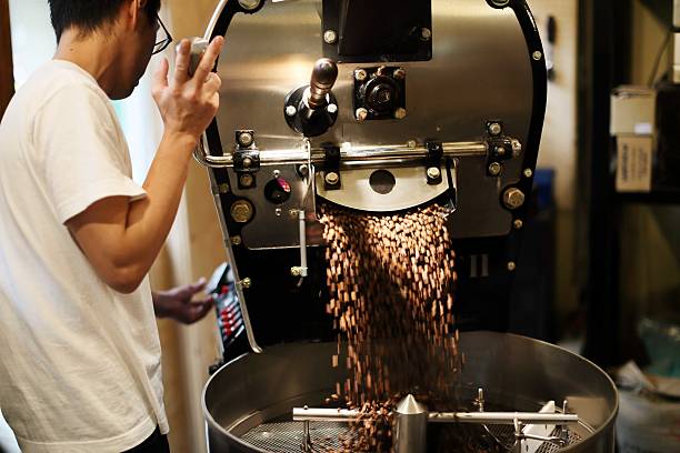istock The coffee beans which a salesclerk roasted by machine 623190724