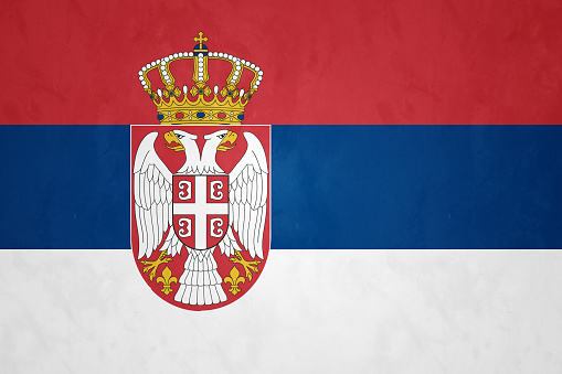 A horizontal tricolour of red, blue, and white; charged with the lesser Coat of arms left of centre - the national flag of Serbia.