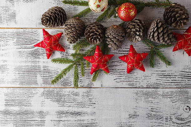 istock Christmas garland on rustic wooden background with copy space 623192764
