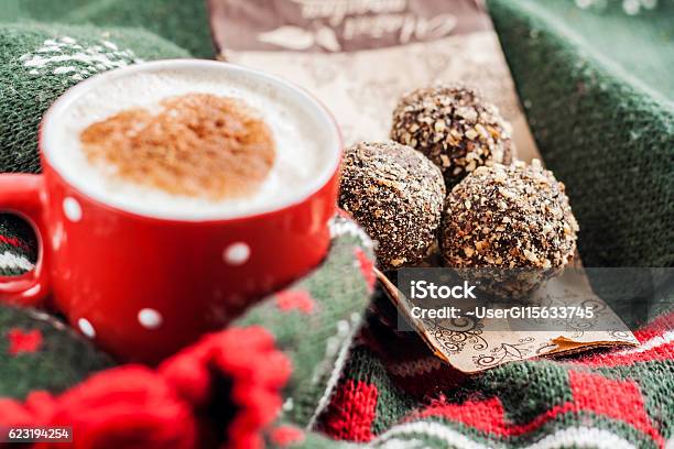 Cakes Truffles And A Cup Of Coffee Wrapped Scarf Stock Photo - Download Image Now - Baked Pastry Item, Brown, Cappuccino