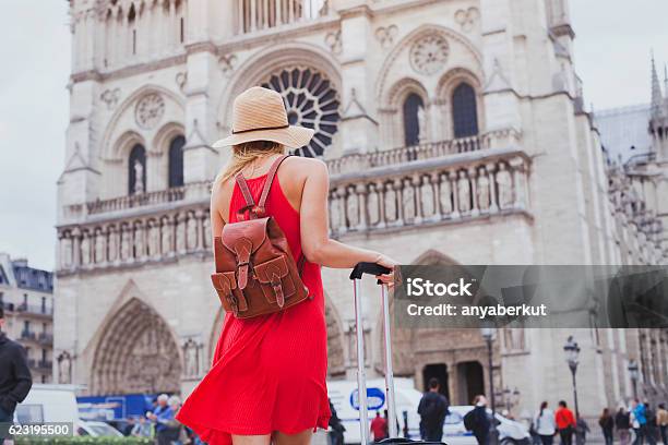 Travel In Europe Tourist Looking At Notre Dame In Paris Stock Photo - Download Image Now