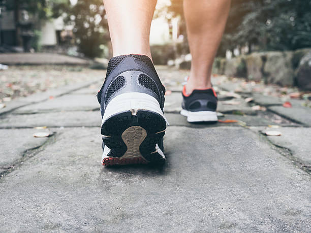 istock Man Walking on trail Outdoor Jogging exercise 623197384