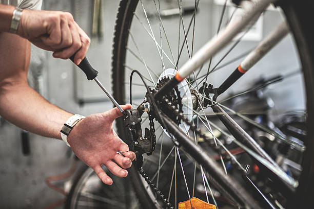 Fixing the bicycle gear shift stock photo