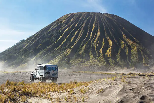 4x4 car service for tourist on desert at Bromo Mountain, Mount Bromo is one of the most  visited tourist attractions in Java, Indonesia